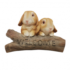 Rabbits on Welcome Log